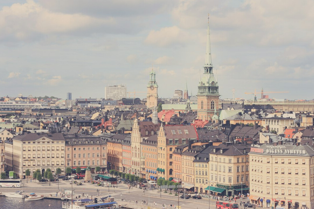 Historic European city skyline under an overcast sky